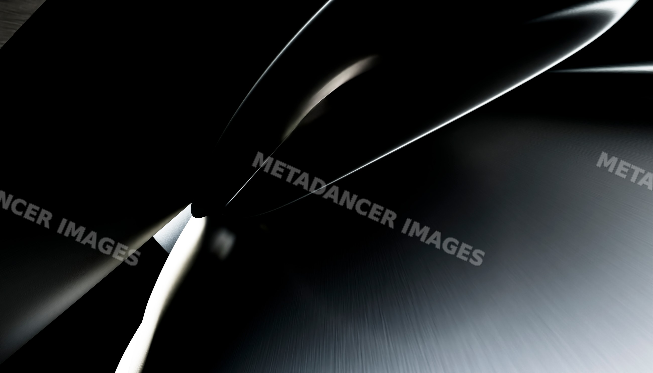 Close-up of a metal gear wheel revealing industrial machinery details