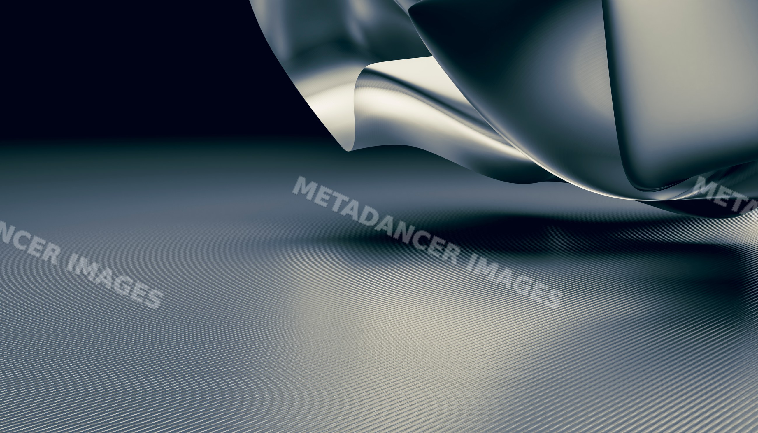 Close-up of metallic fabric with smooth reflective folds