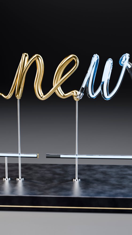 Neon light sign with gold and blue lettering spelling new