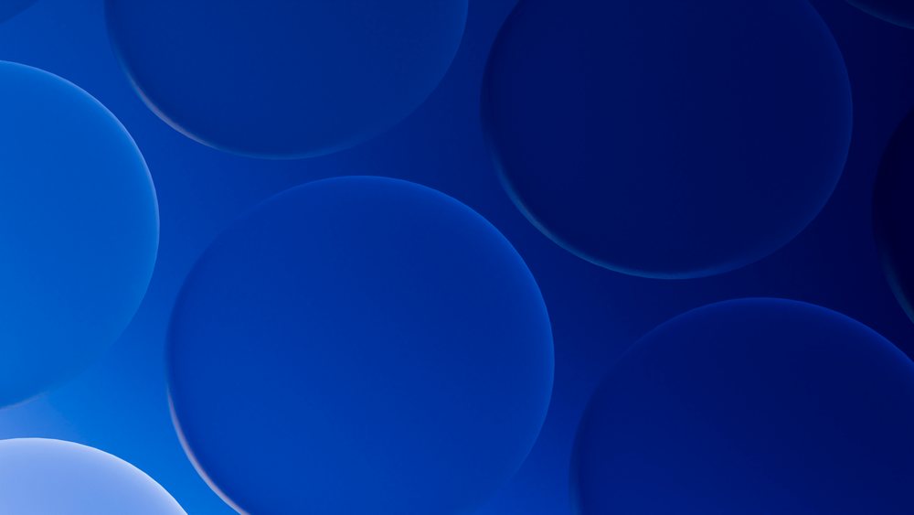Abstract digital artwork of overlapping blue circles with smooth