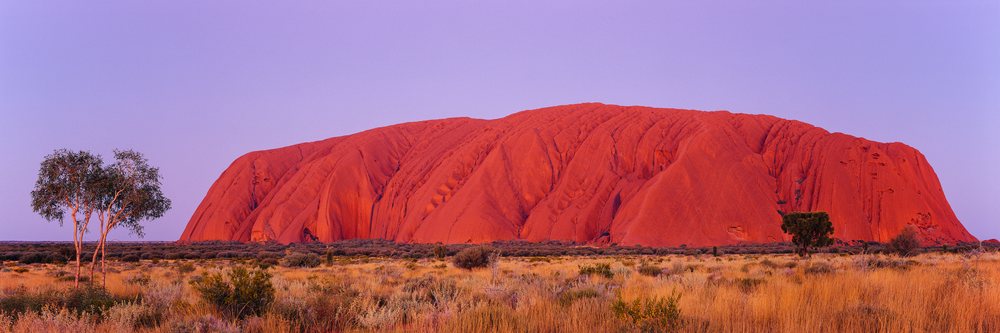 Ayers rock monolith glowing red