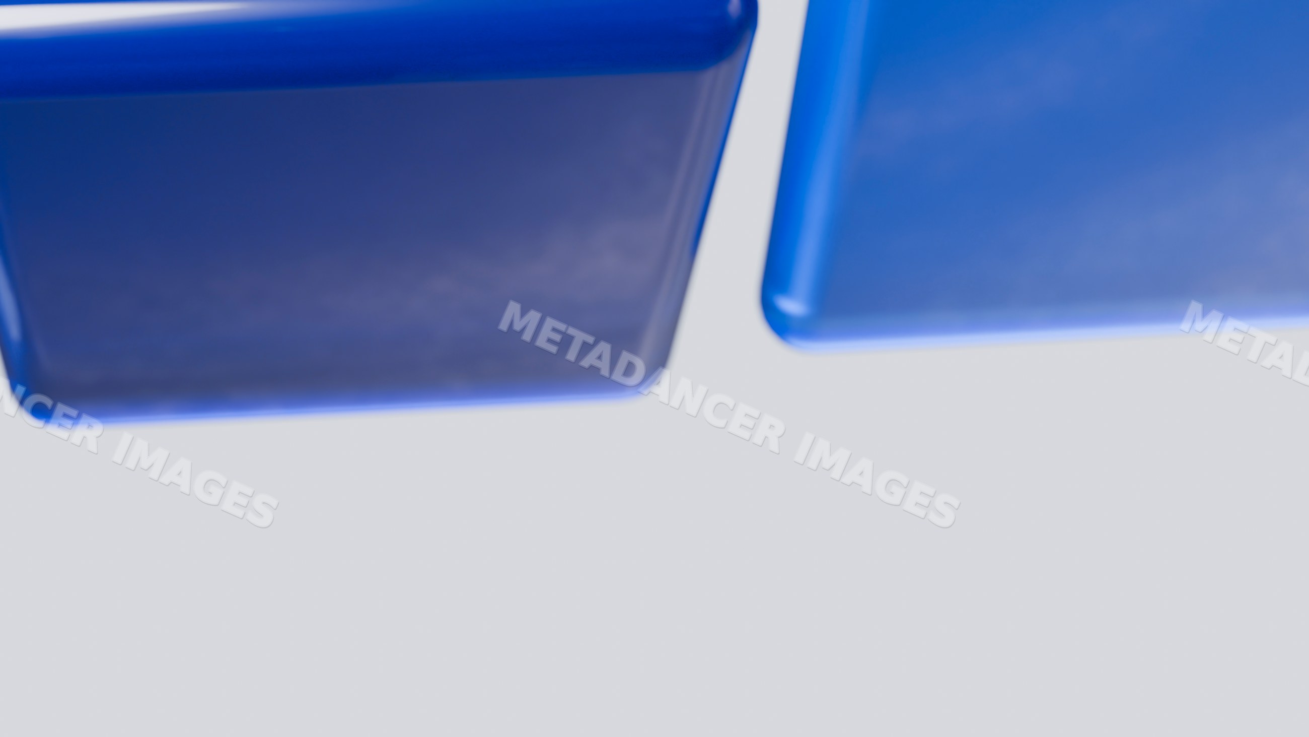 Blue geometric cubes in minimalist abstract composition