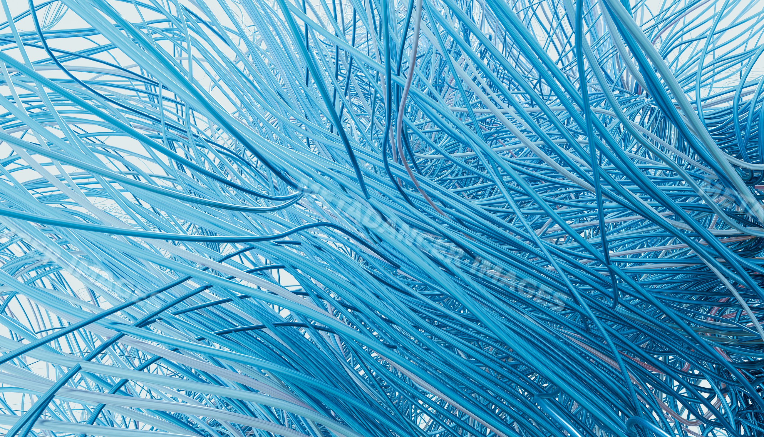 Close-up of dense cluster of tangled blue wires creating complex