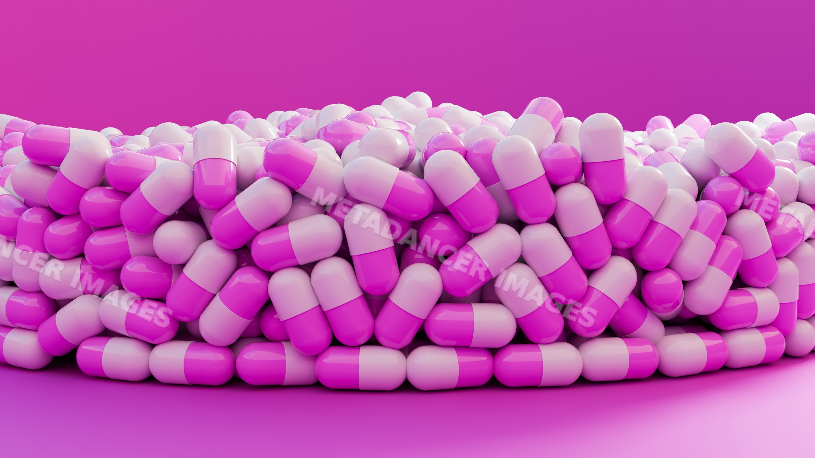 Pile of pink and white medicine capsules on pink background