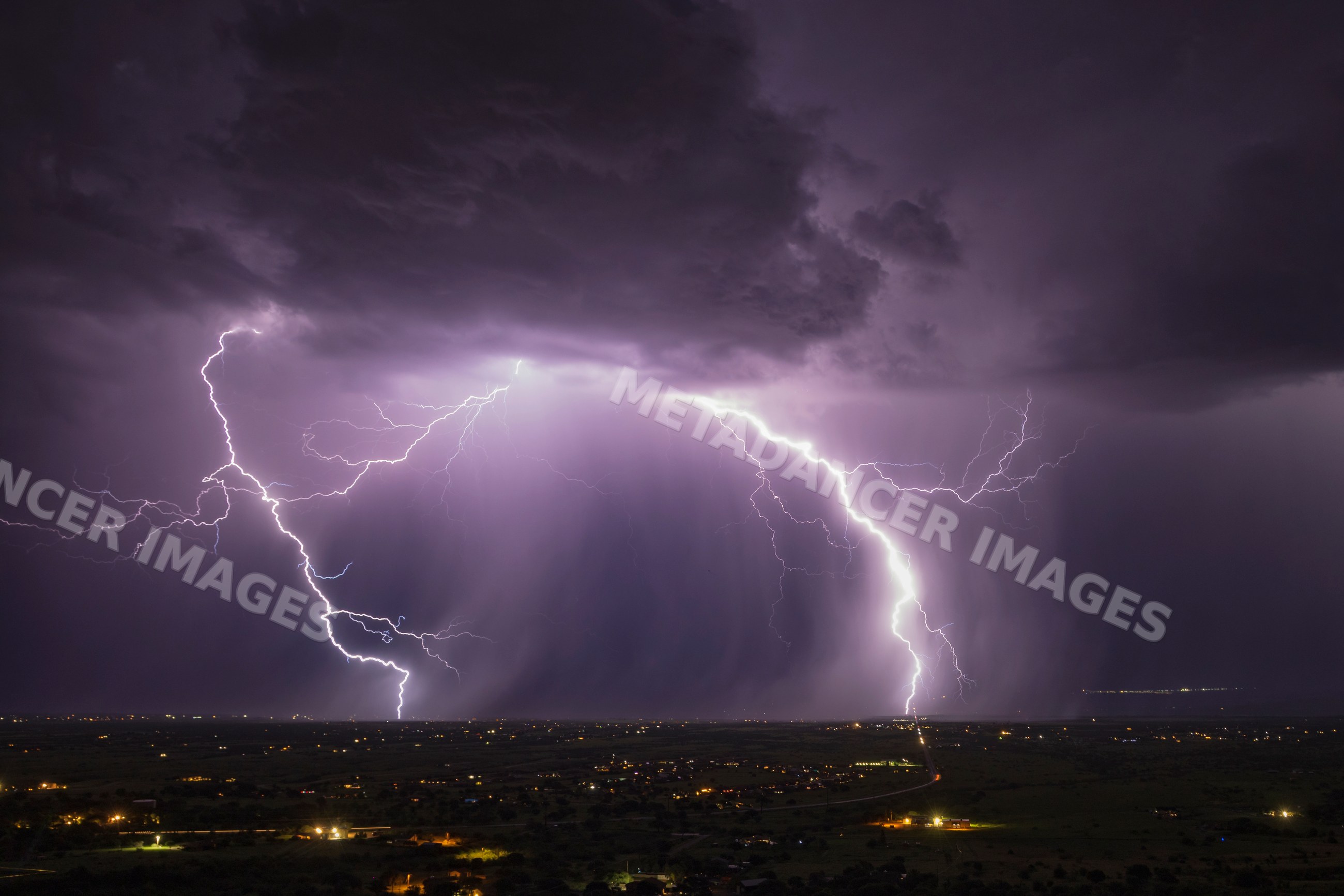 Lightning strikes over sierra vista during a night thunderstorm