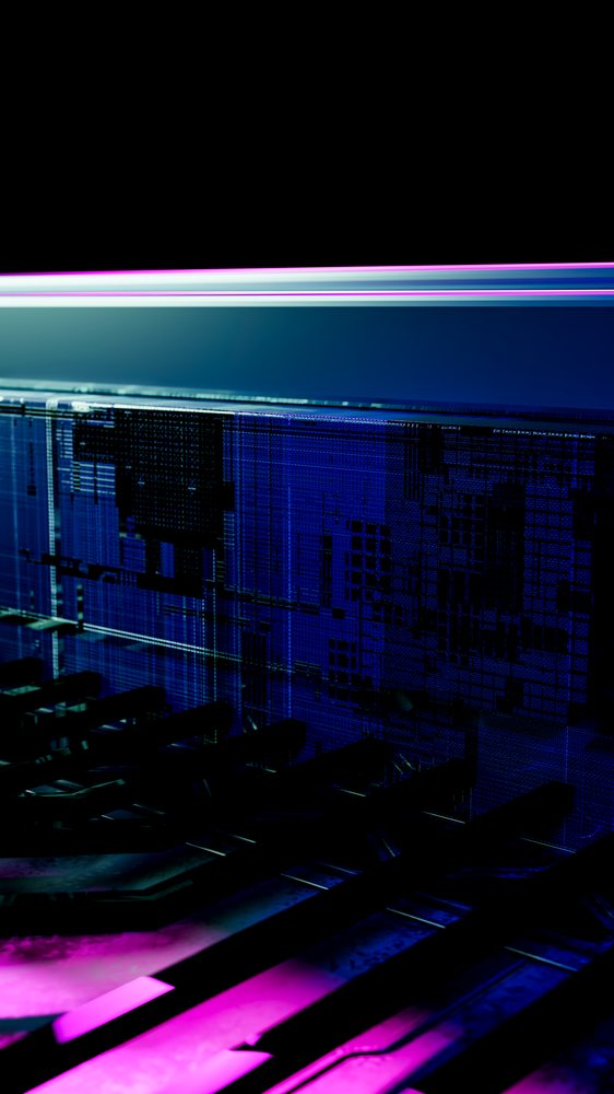 Close-up of computer chip circuit board with blue and purple light