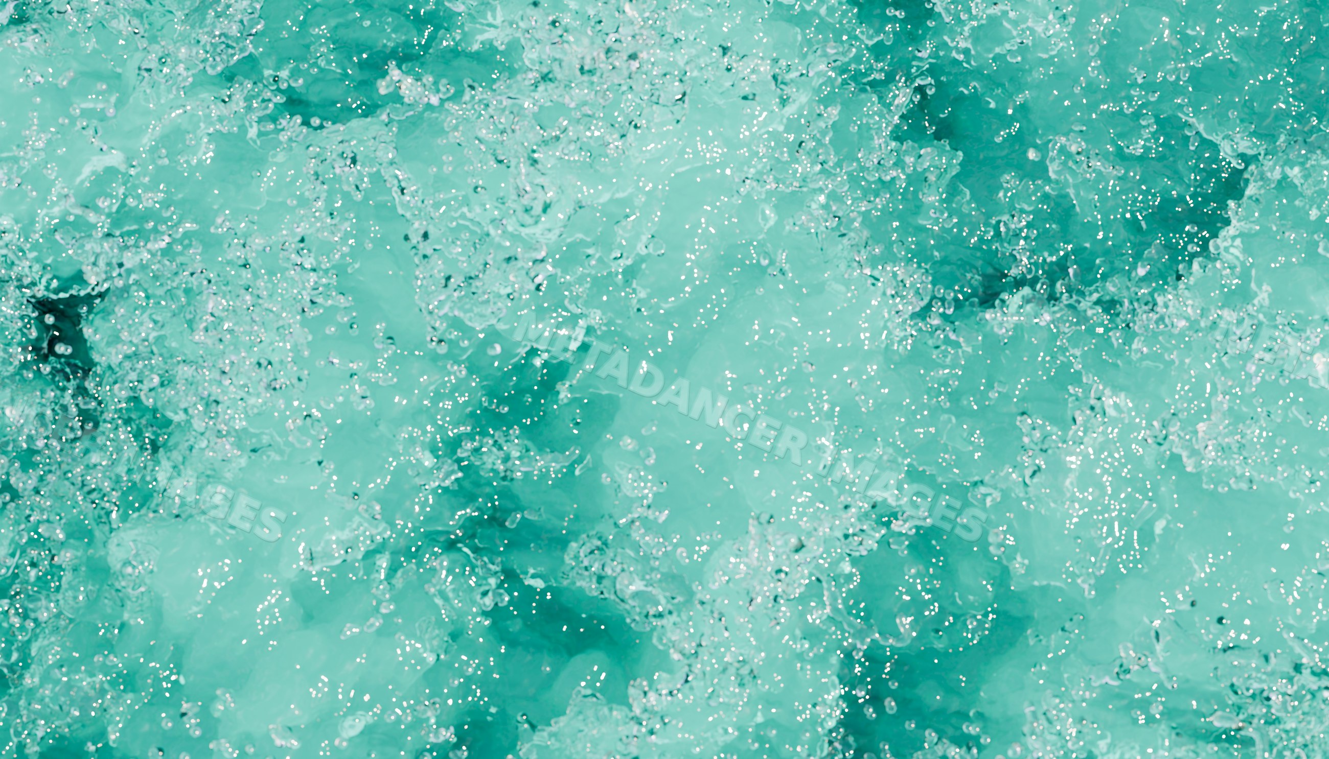 Bubbling clear blue water with sparkling droplets and dynamic movement