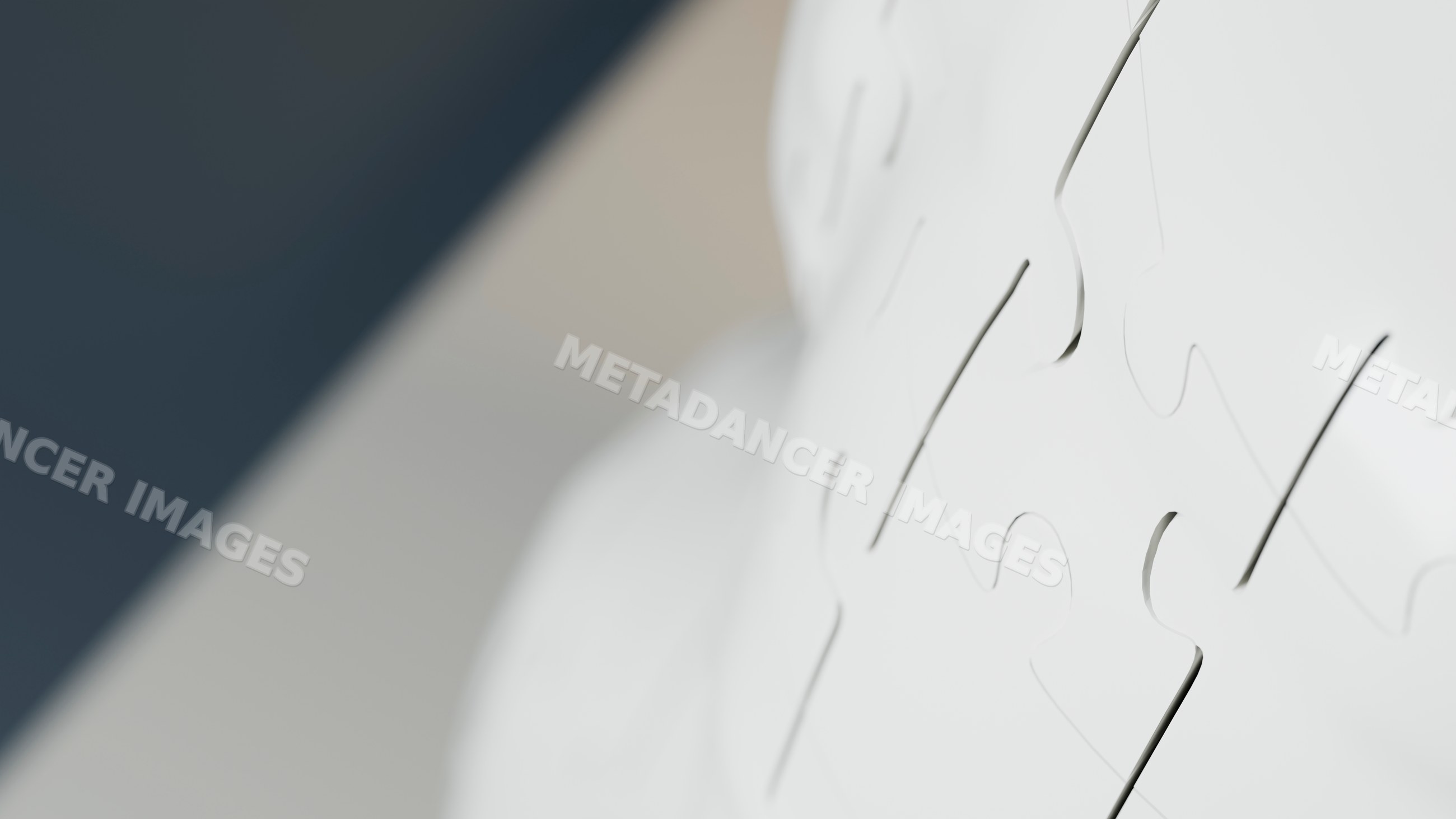 Close-up of assembled white interlocking puzzle pieces