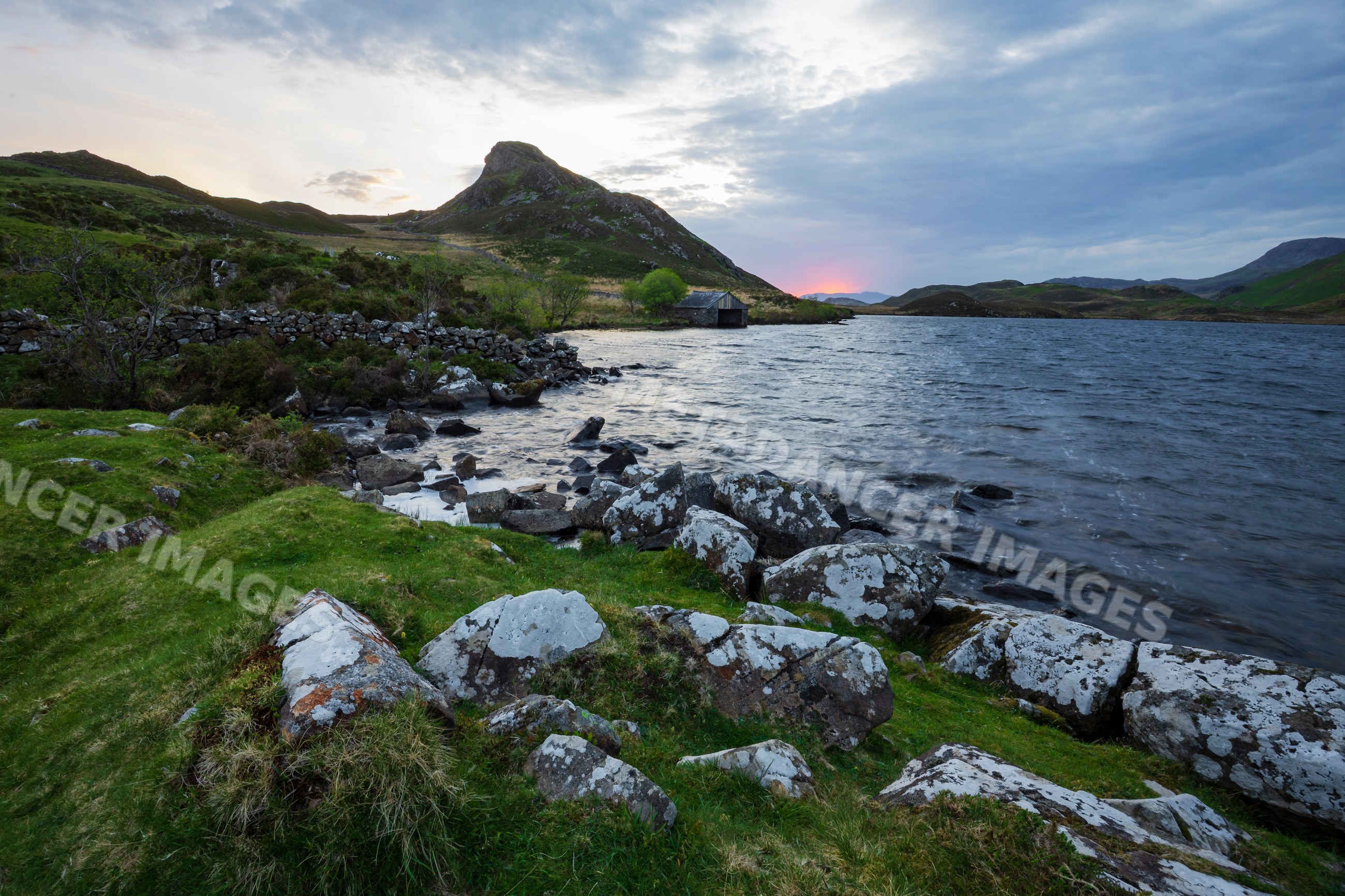 Cregennen lakes with rocky shore and mountain