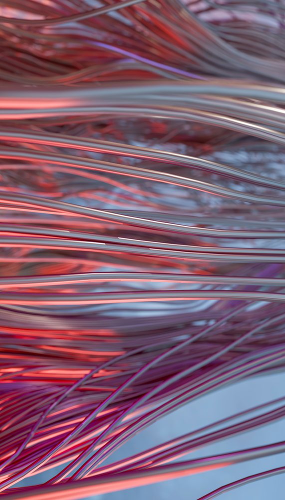 Close-up of twisting metallic wires with red and purple light