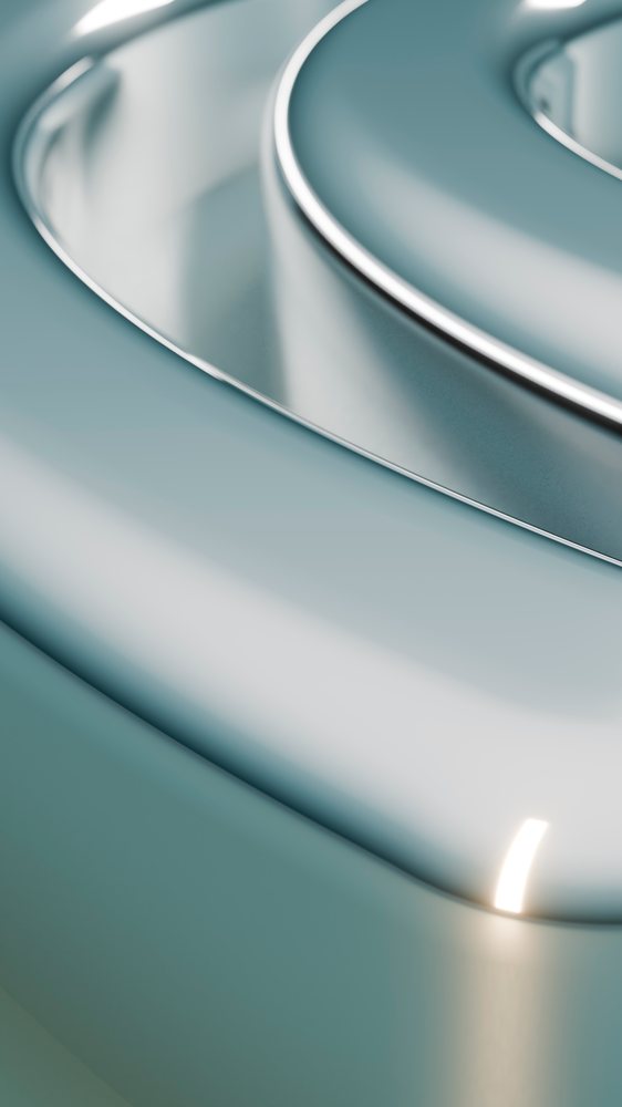 Close-up curved shiny metallic surface with smooth texture