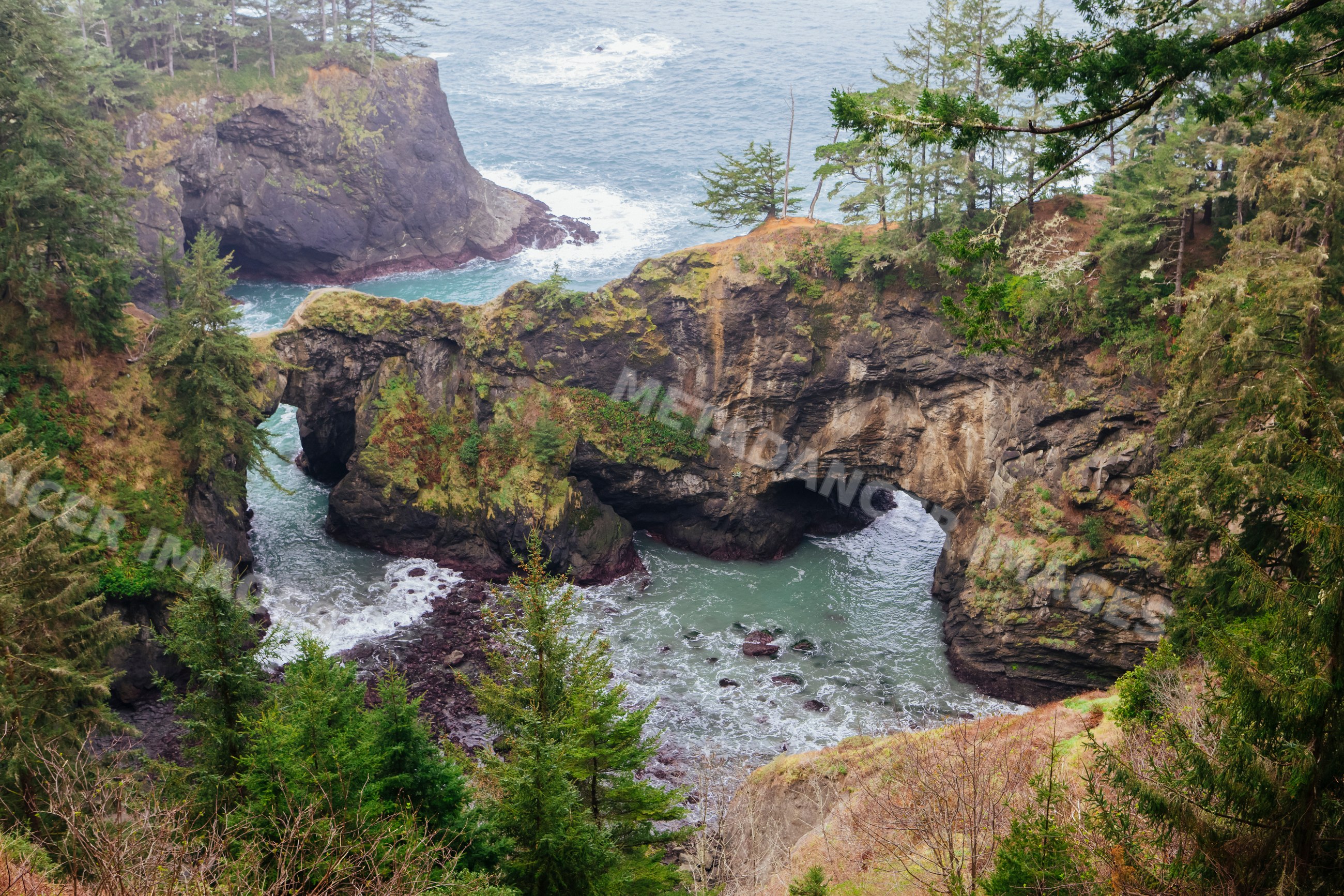 Sea arch rock formation Oregon coastline