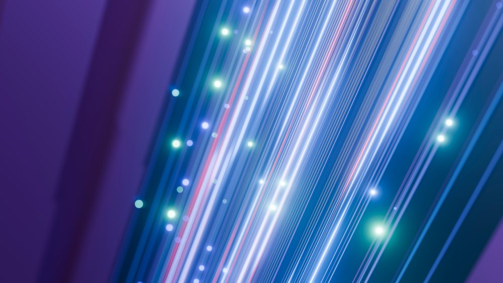 Glowing fiber optic strands emitting colorful light