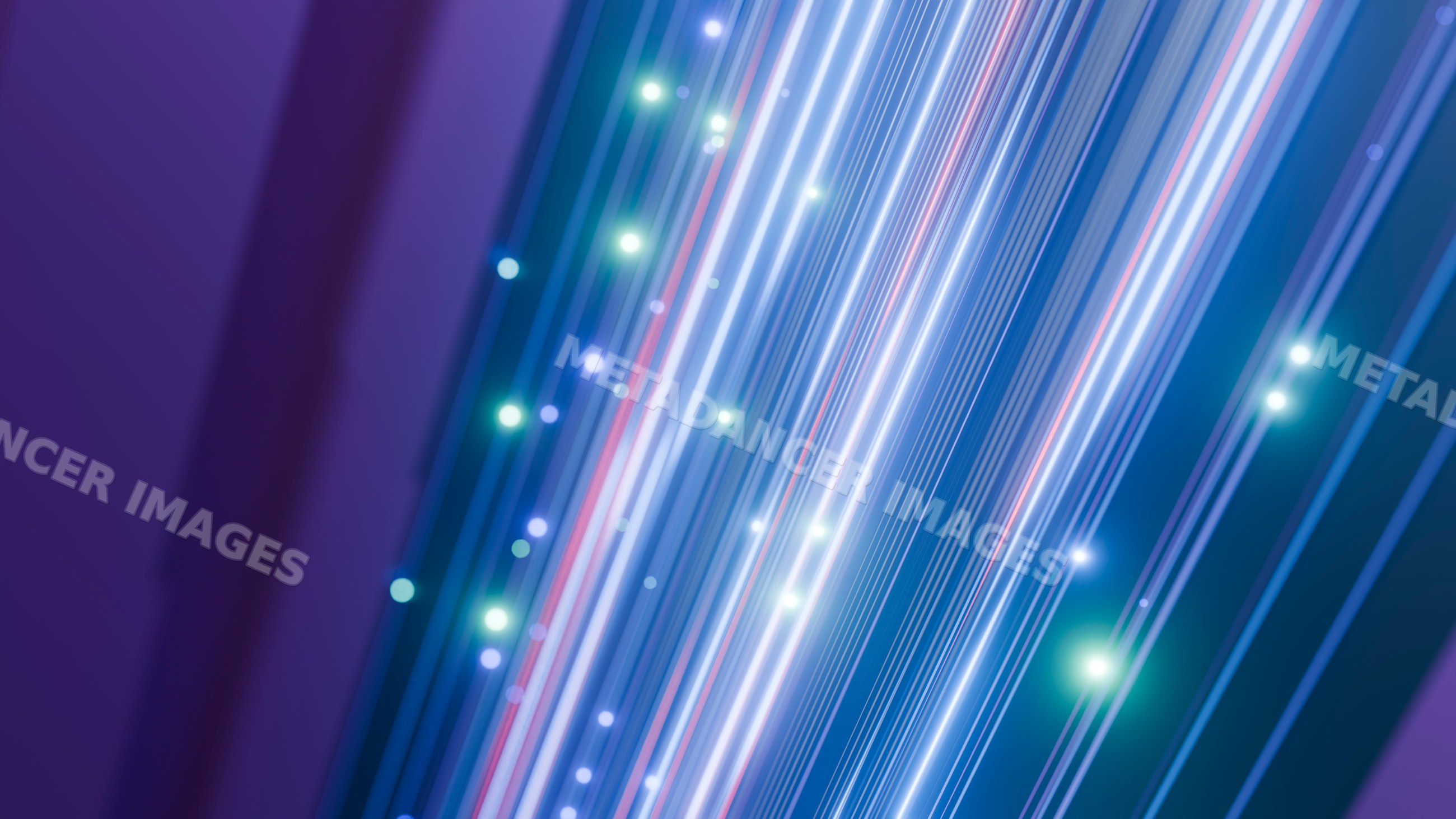 Glowing fiber optic strands emitting colorful light