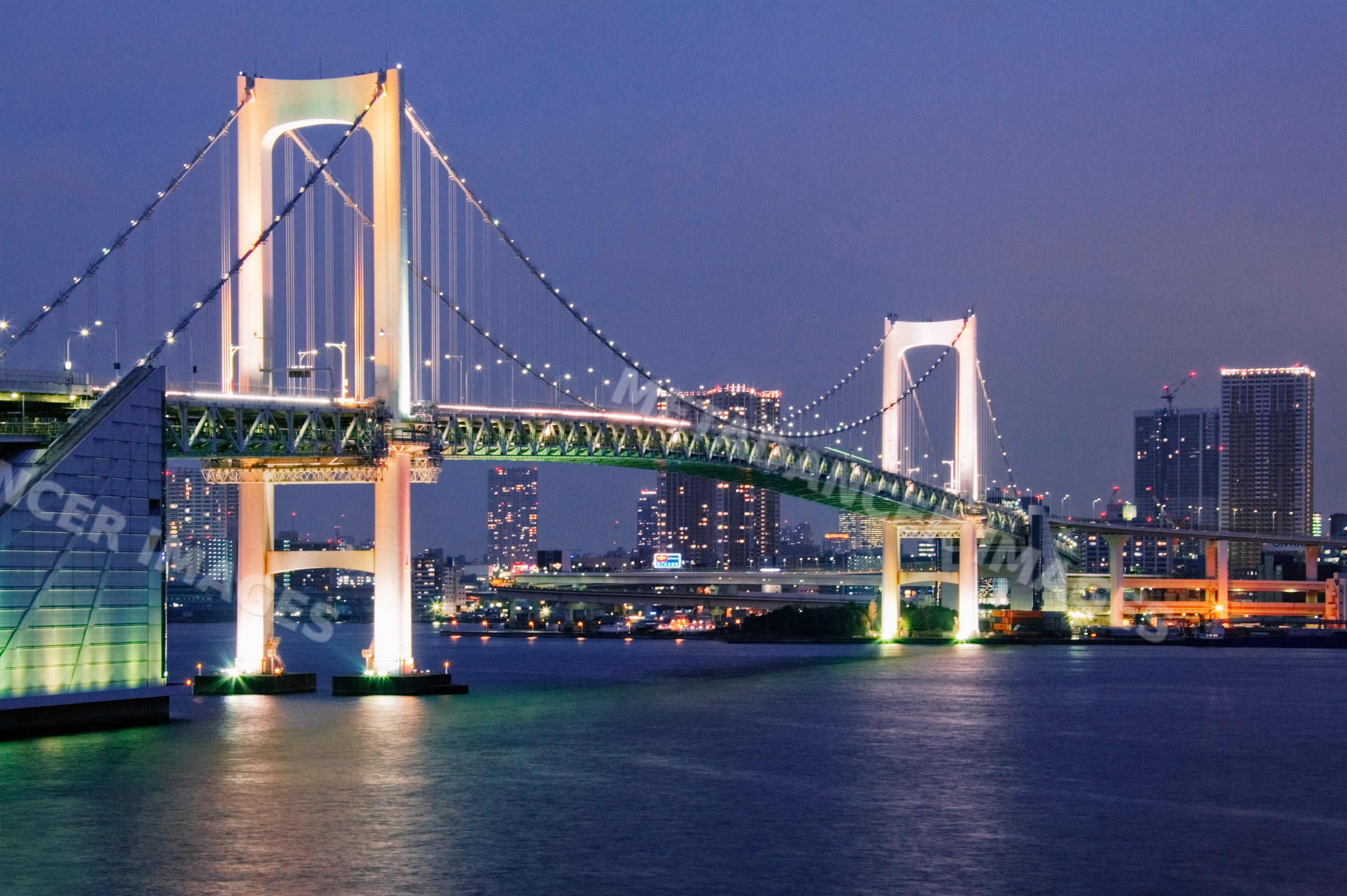 Rainbow bridge over tokyo bay at night japan