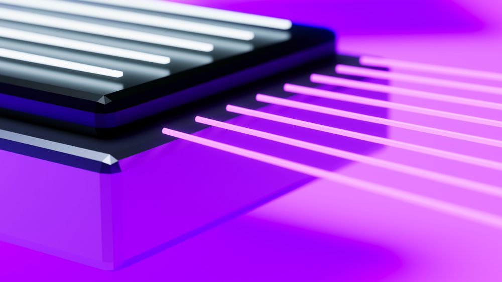 Close-up of glowing neon rectangular light with purple illumination