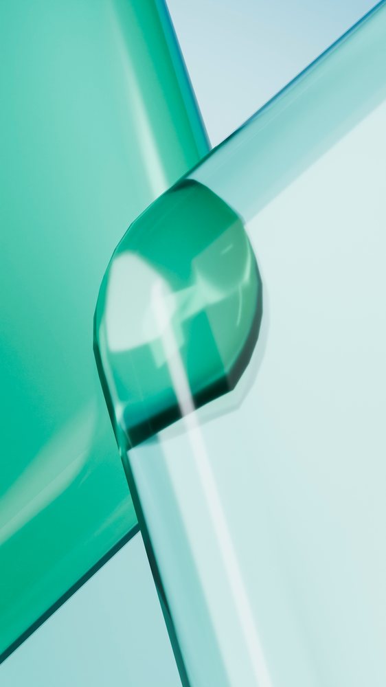 Close-up abstract view of intersecting blue and green transparent