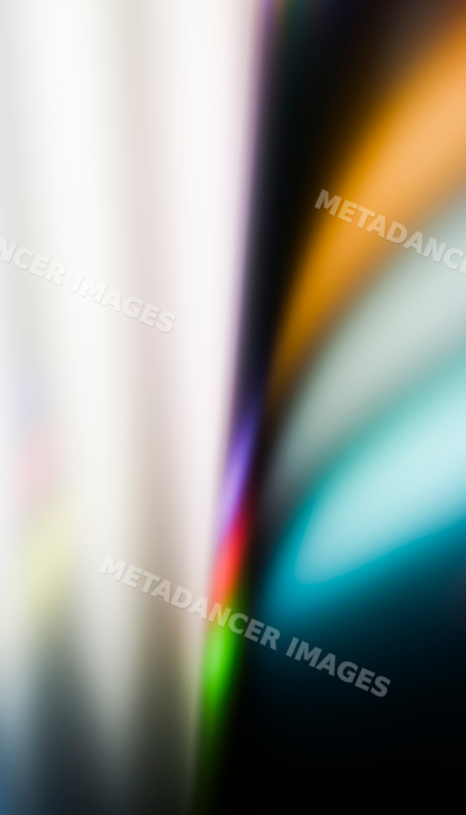 A multicolored abstract background with smooth blurred light