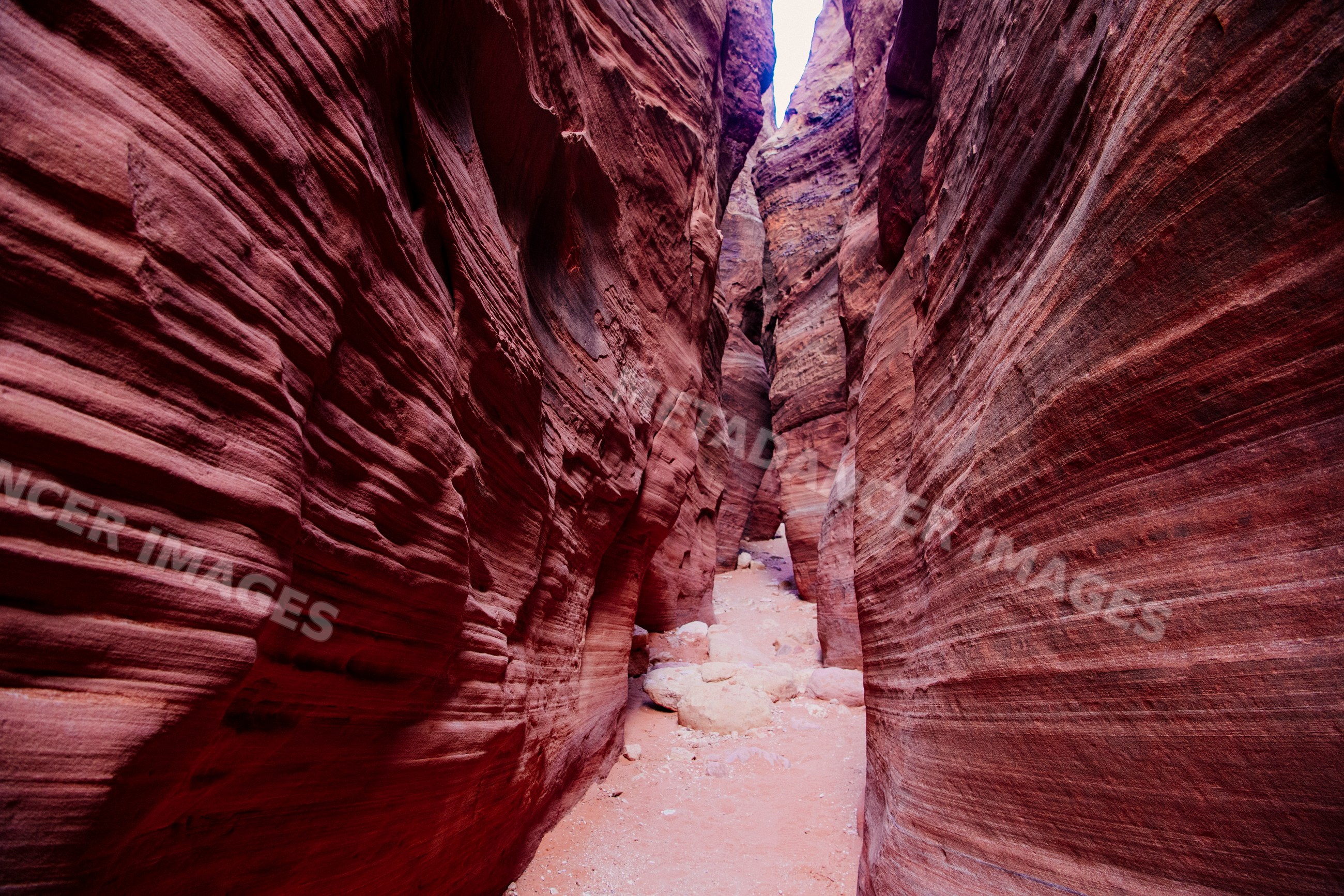 Slot canyon with narrow red sandstone walls in buckskin gulch Utah