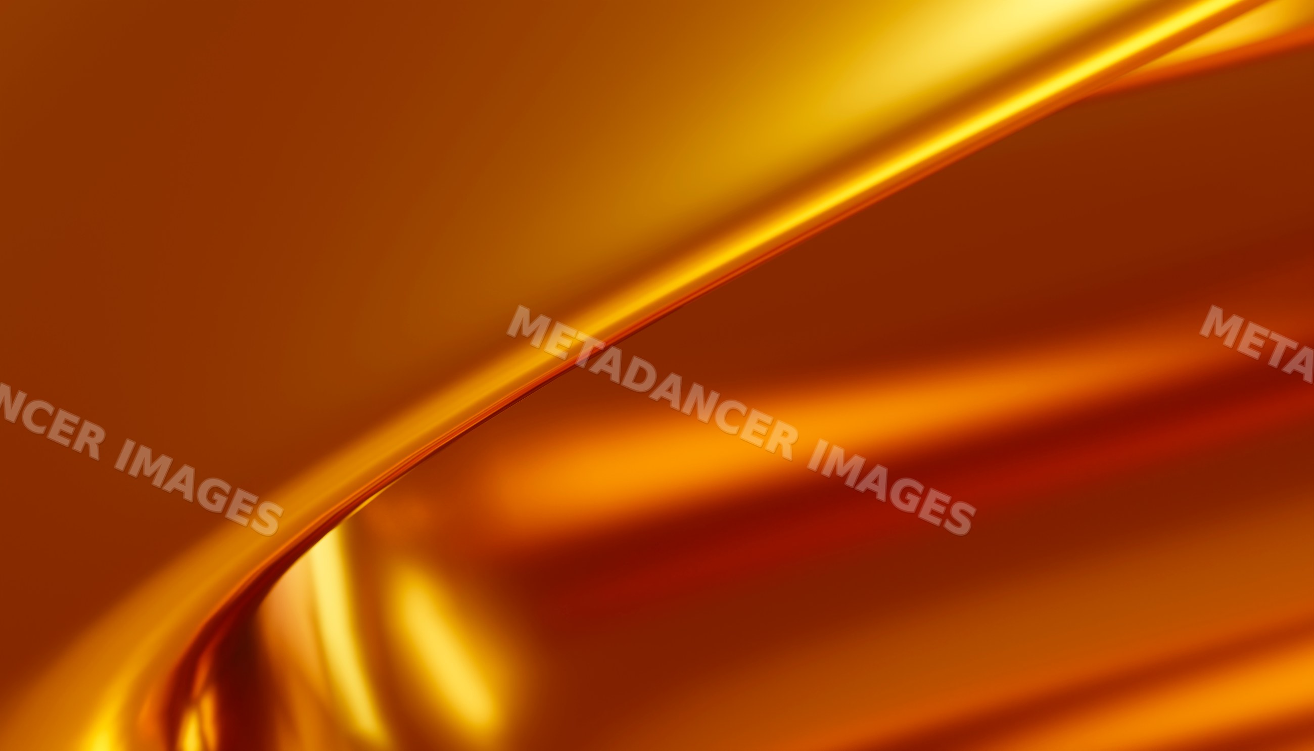 Gold metallic surface with smooth reflective curves and warm