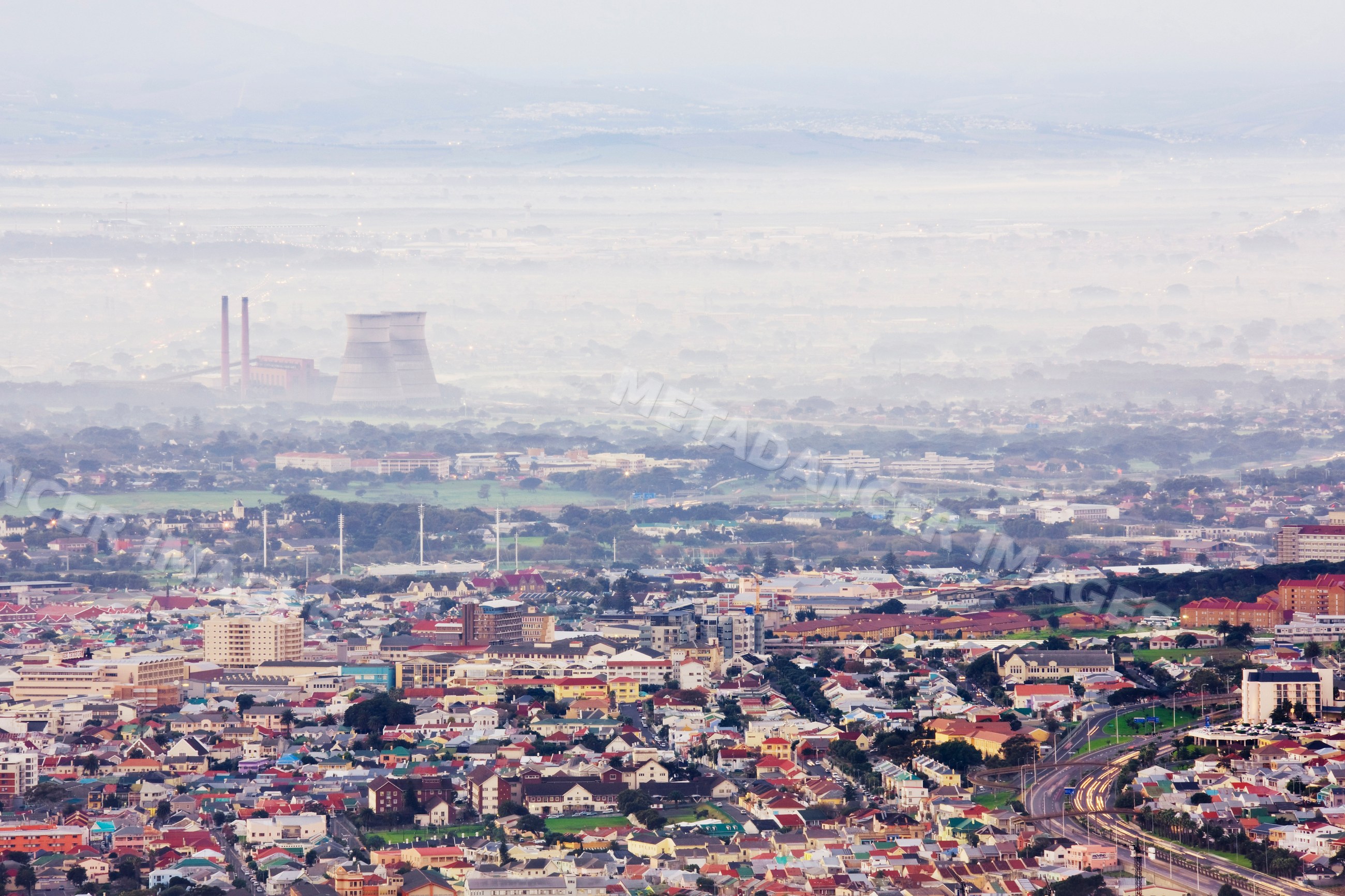 Aerial view of cape flats cityscape with morning fog, south africa