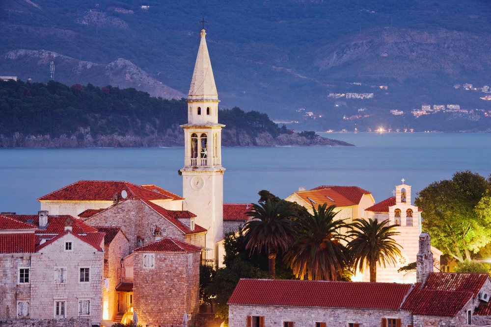 Budva church tower and historic mediterranean coastal town