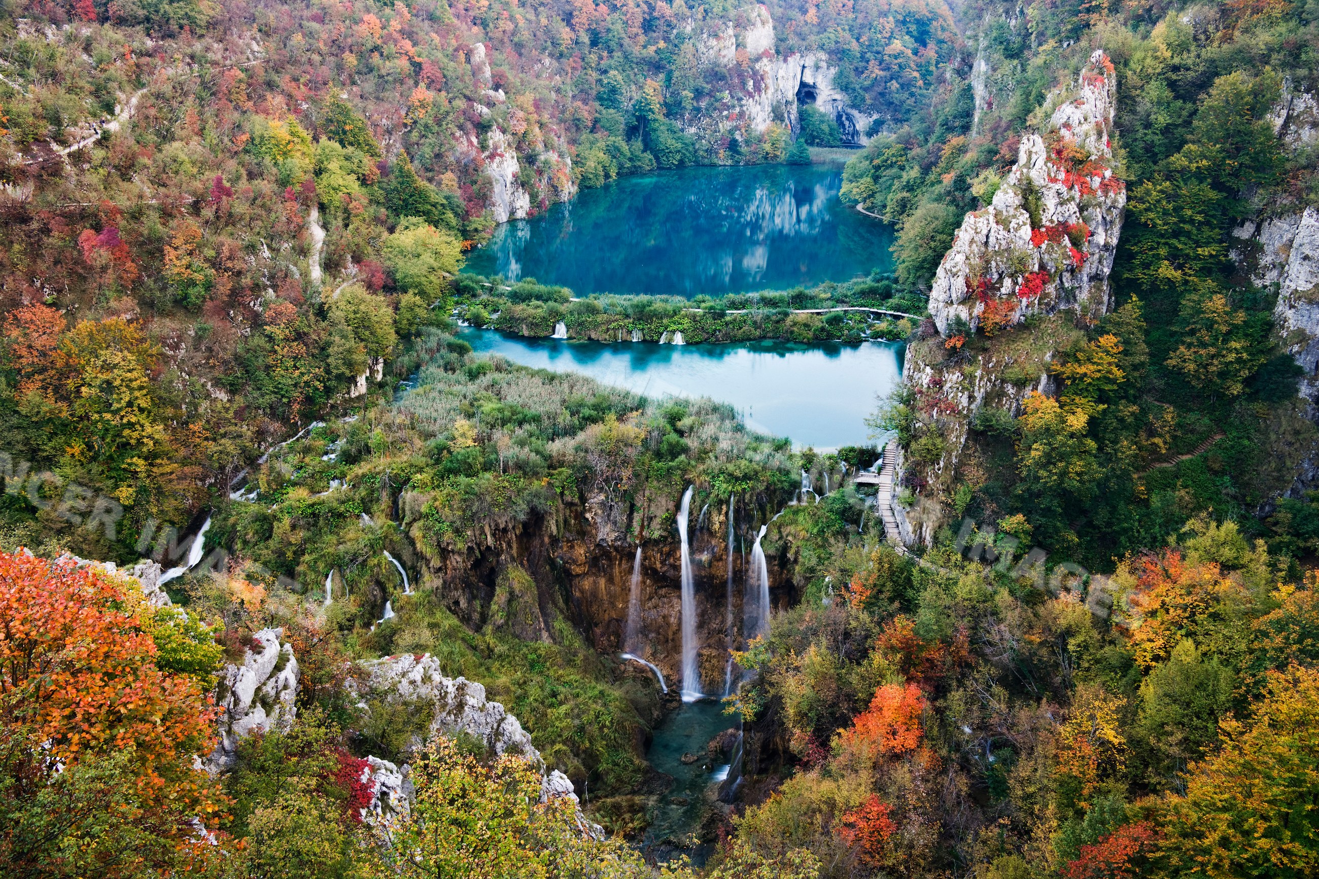 Waterfall flowing through autumn forest, croatia