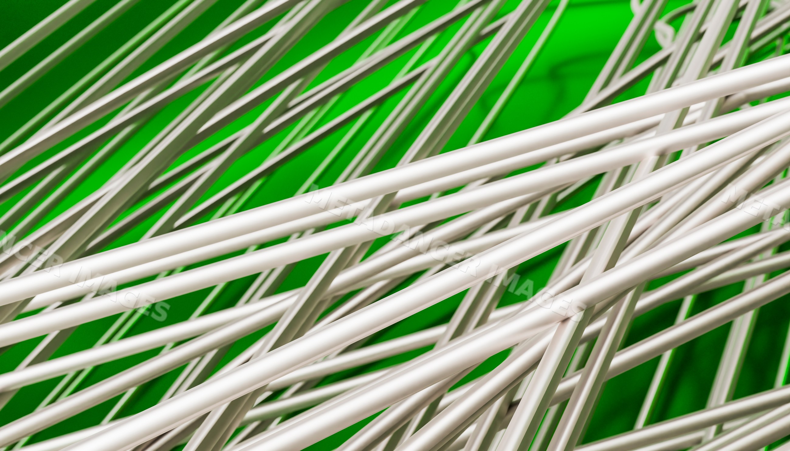 White rice noodles in green bowl with bamboo basket