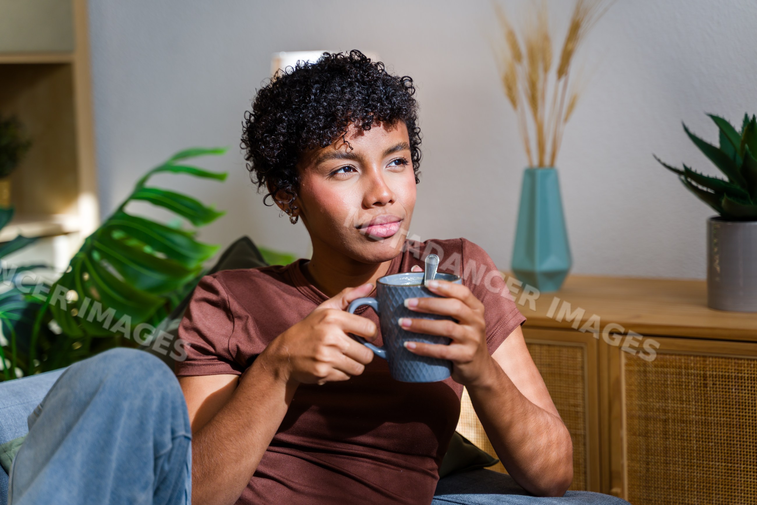 African American woman relaxing with a mug