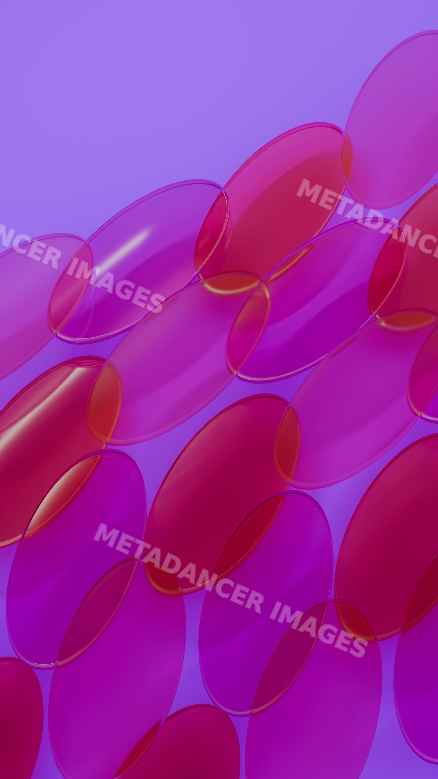 Close-up of pink and purple transparent softgel capsules