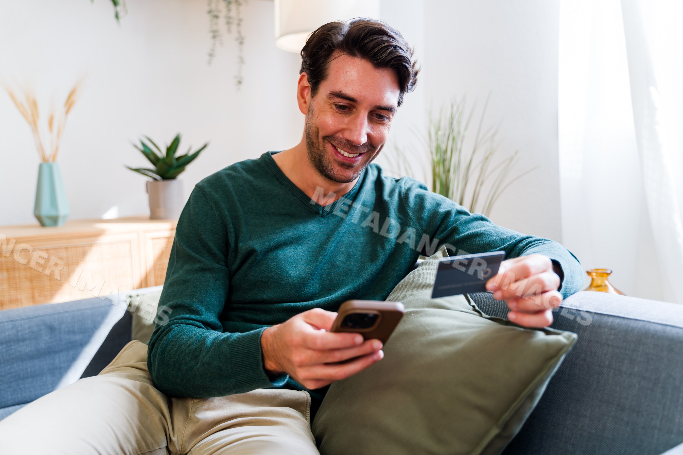 White man using phone for mobile payment