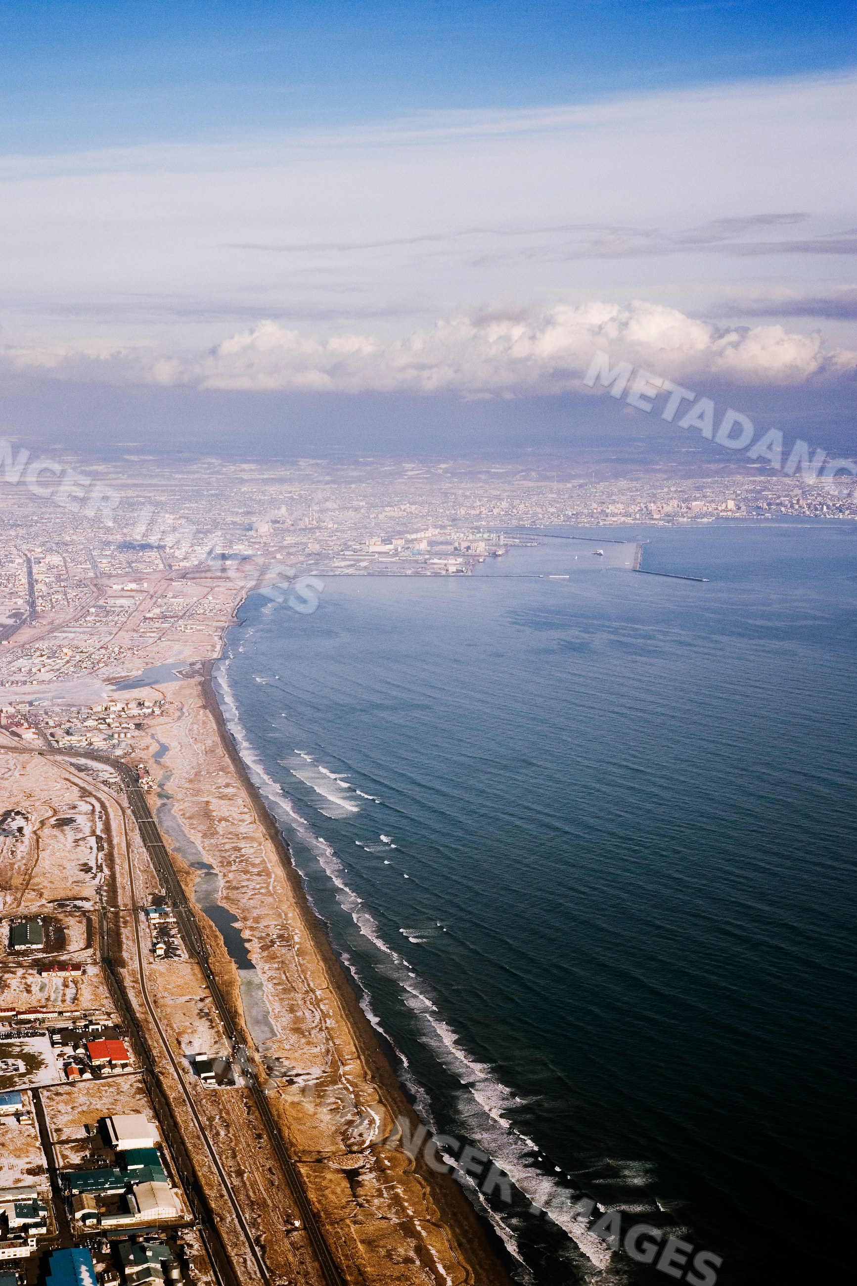 Aerial view of coastline and harbor, Japan