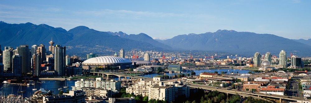 Vancouver skyline with mountains and harbor, canada