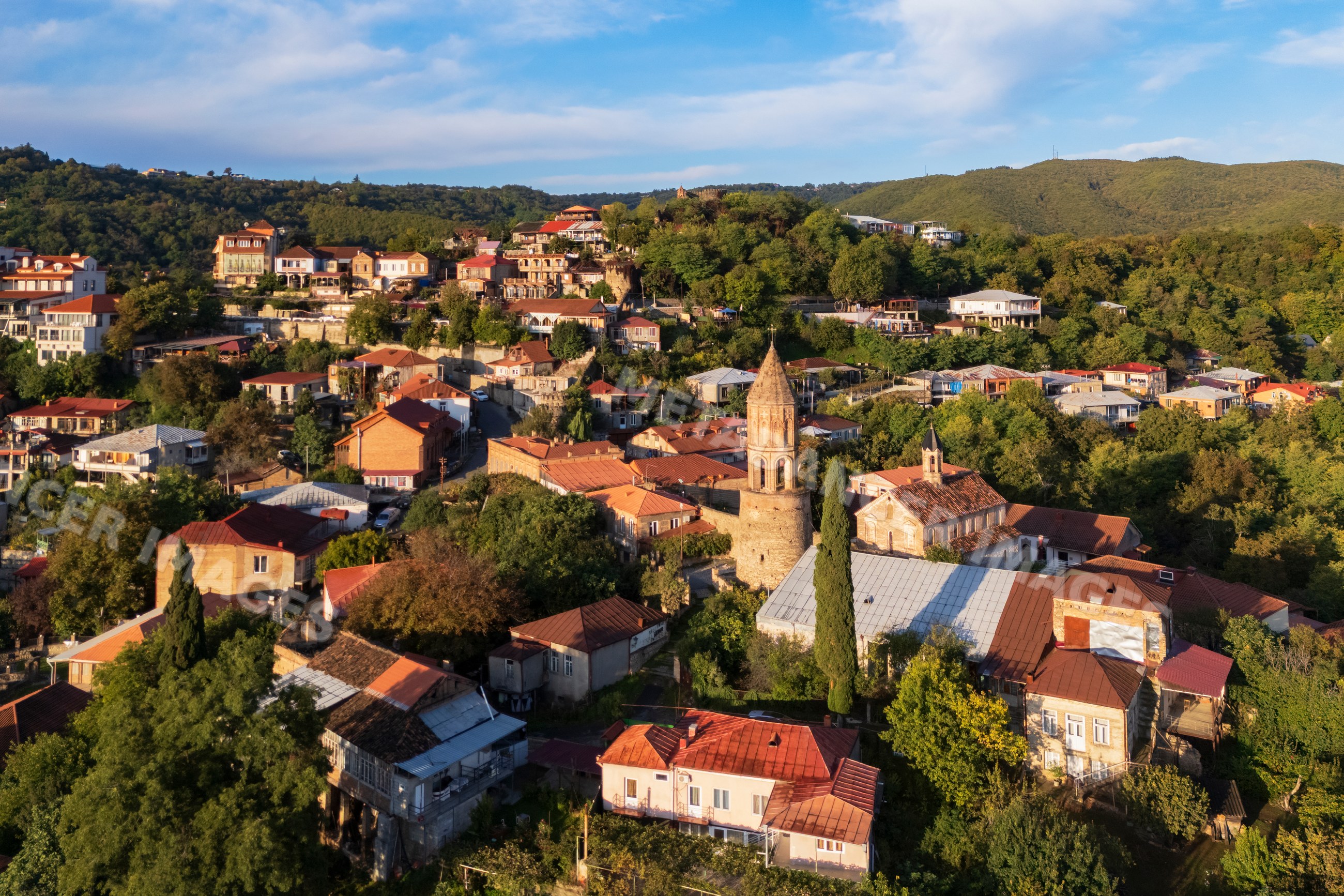 St George's Church and village rooftops at Sunrise in sighnaghi