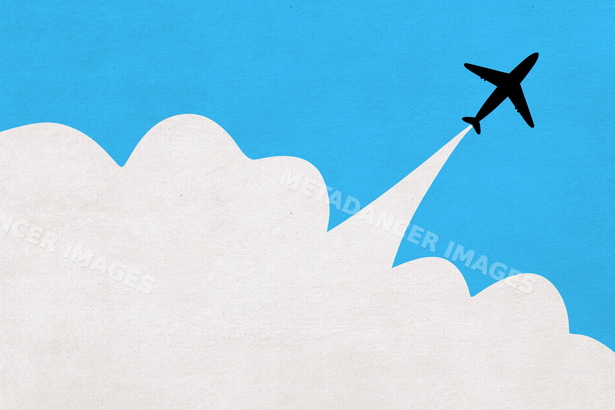 Silhouette of an airplane flying through blue sky and white clouds