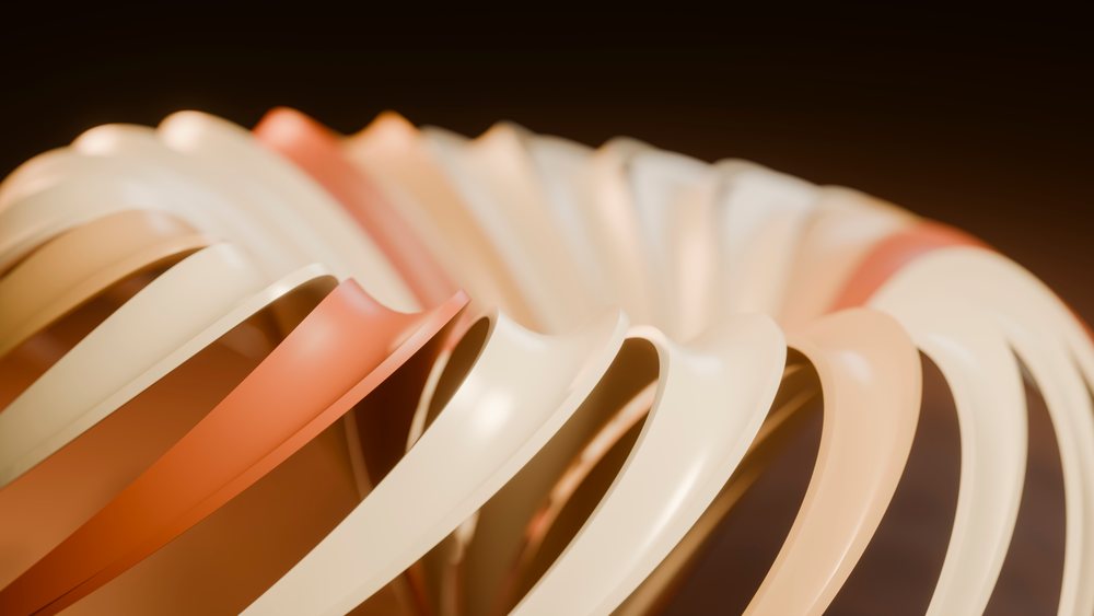 Abstract twisted ring sculpture with smooth cream and peach tones