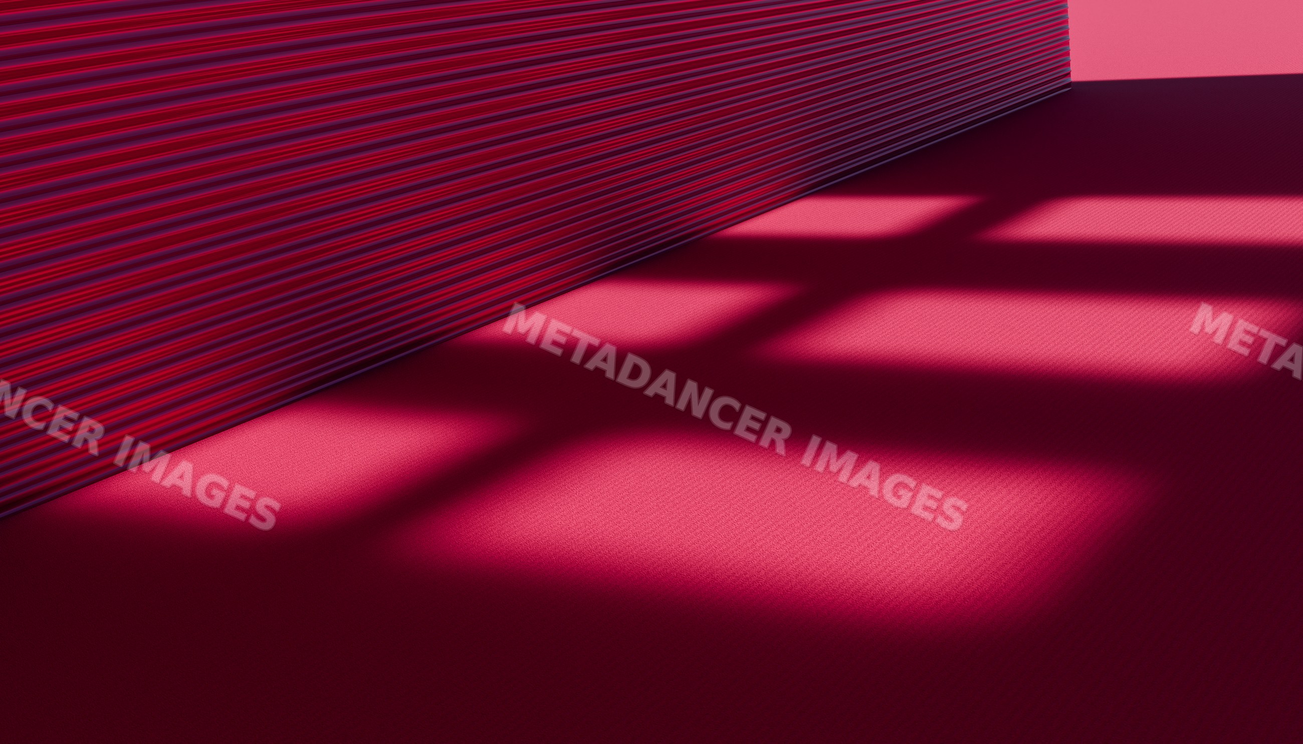 Stack of red paper sheets casting geometric shadows on a red surface