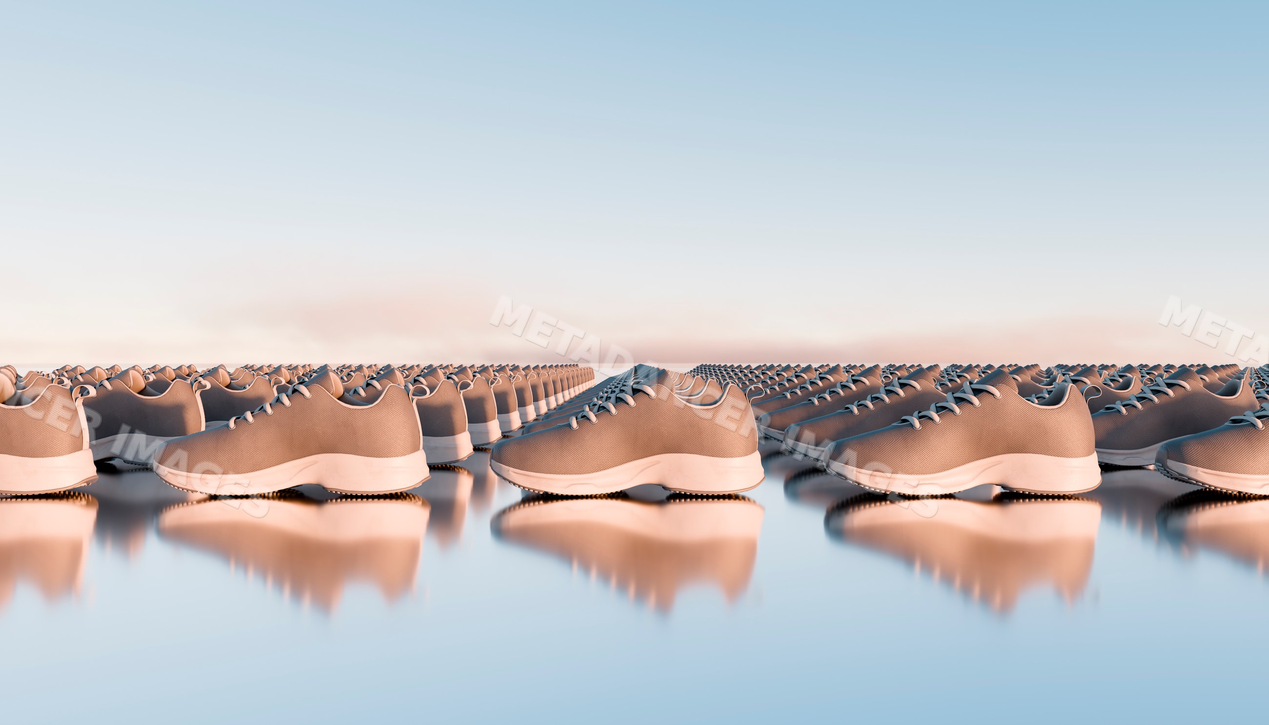 Rows of modern tan sneakers with white soles reflecting on shiny