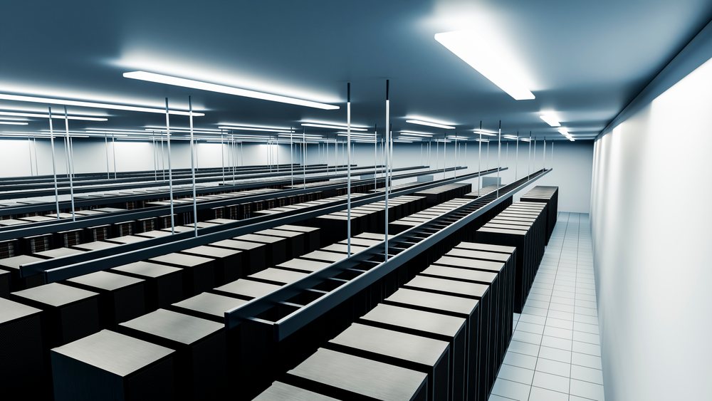 Modern data center with rows of server racks and cooling system