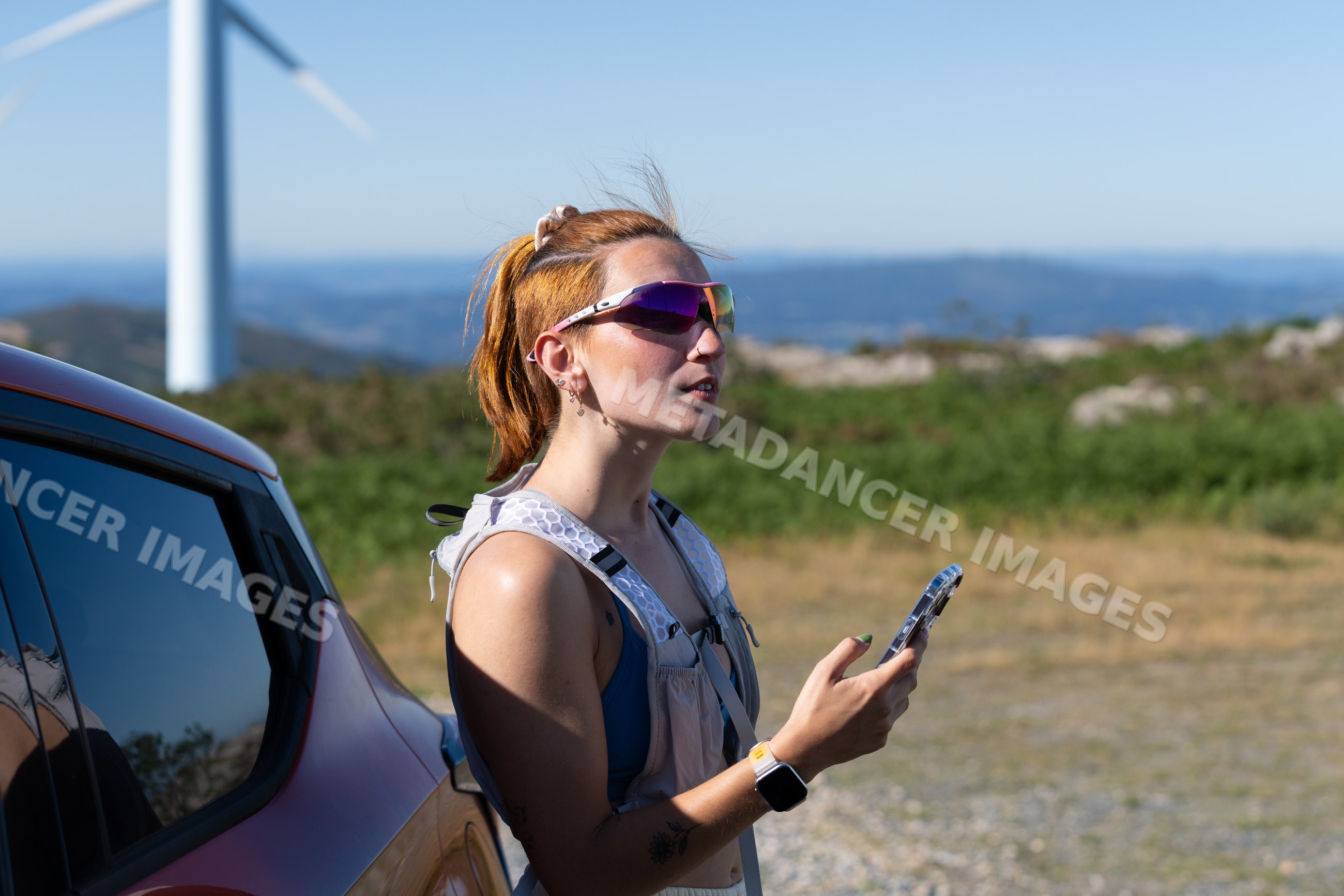 White Woman using smartphone outdoors
