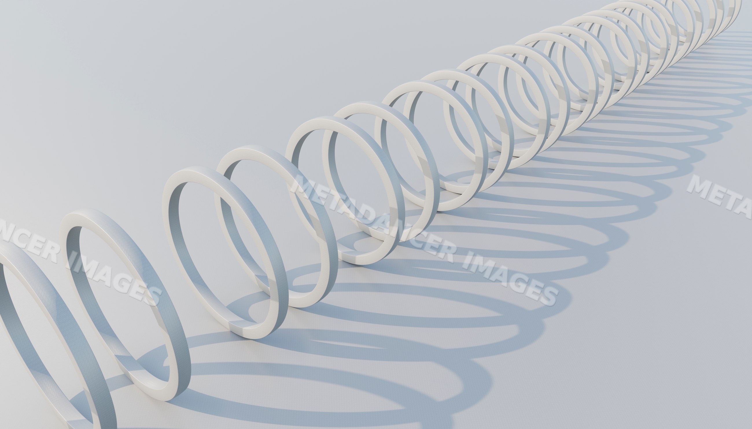 White continuous spiral ring casting repeating shadows on a white