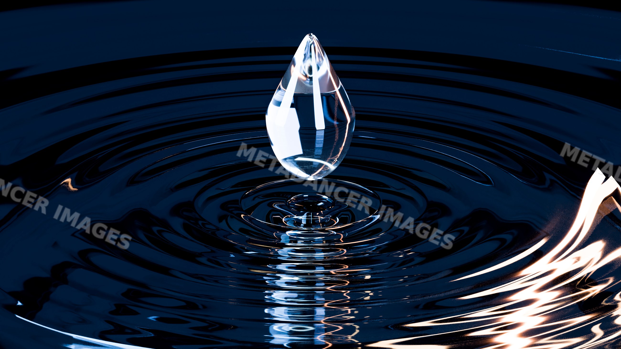 Water droplet suspended above surface creating ripples and reflections