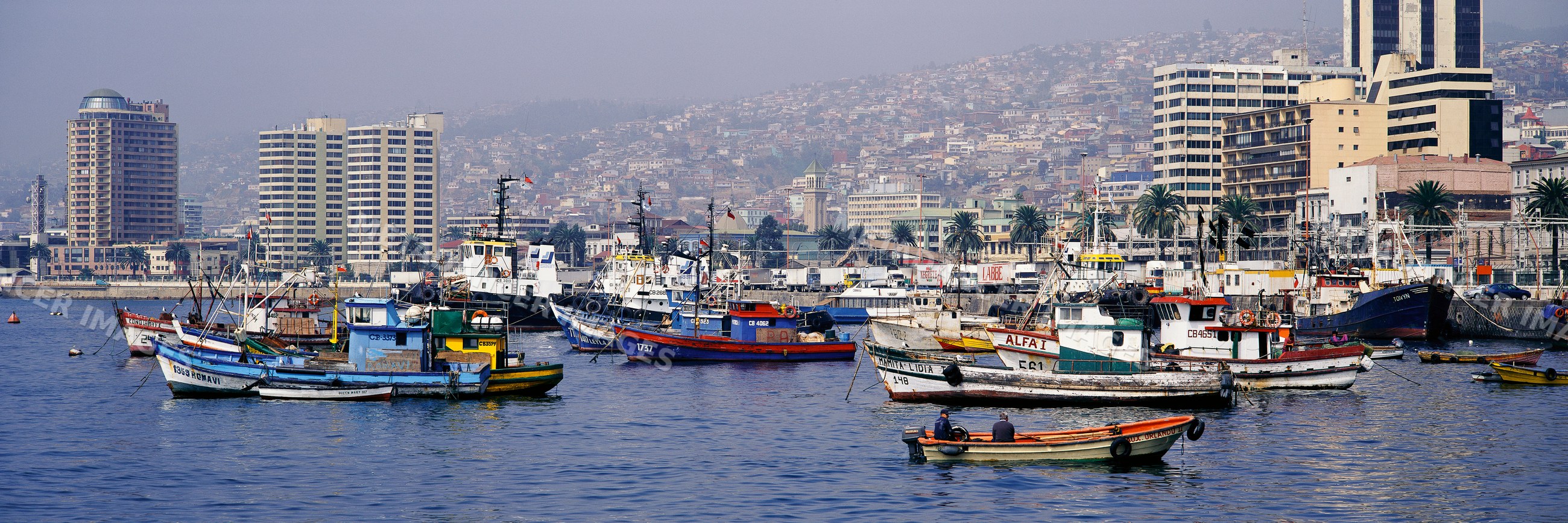 Fishing boats moored in the harbour of valparaiso, chile