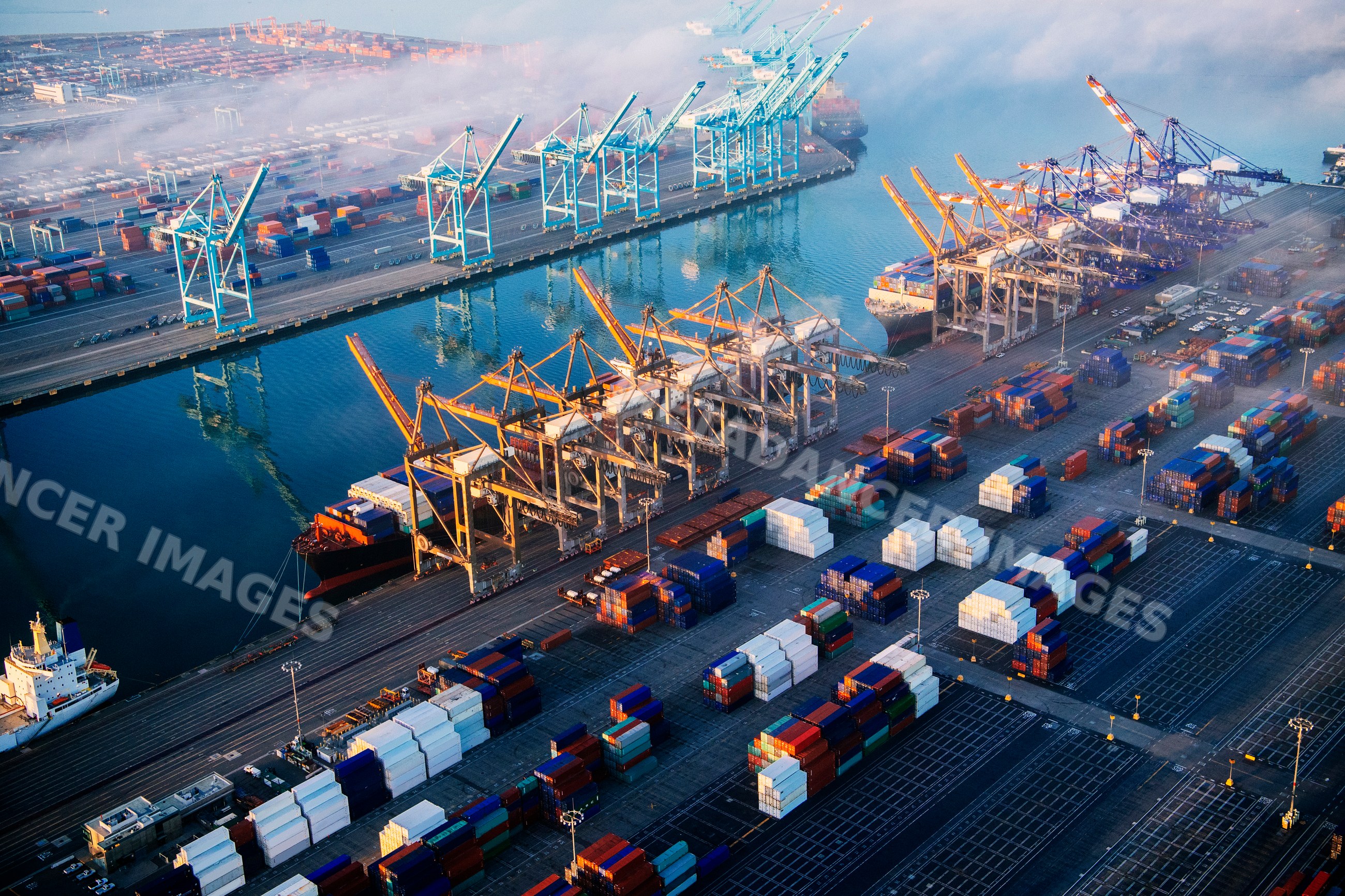 Shipping containers and dock cranes