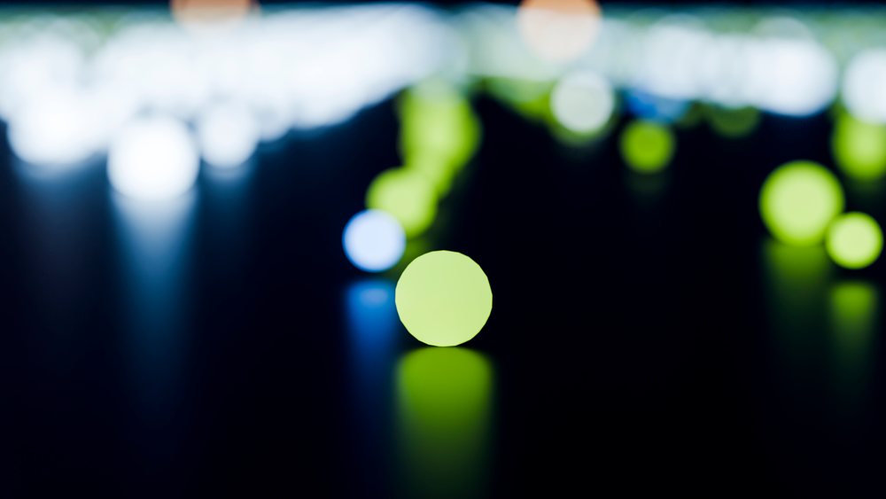 Colorful round bokeh lights glowing on dark reflective surface