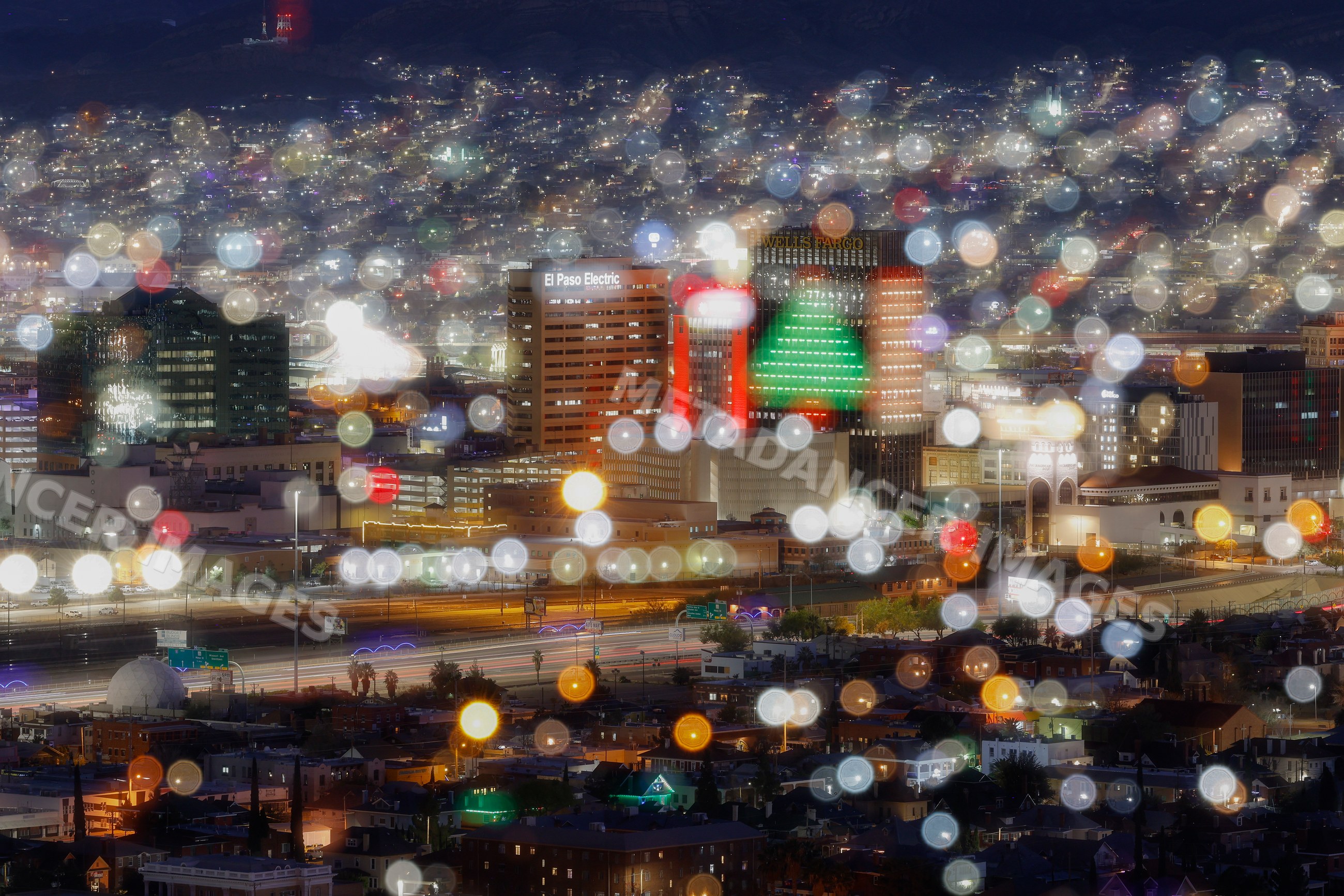 El Paso skyline illuminated with city traffic at night in Texas