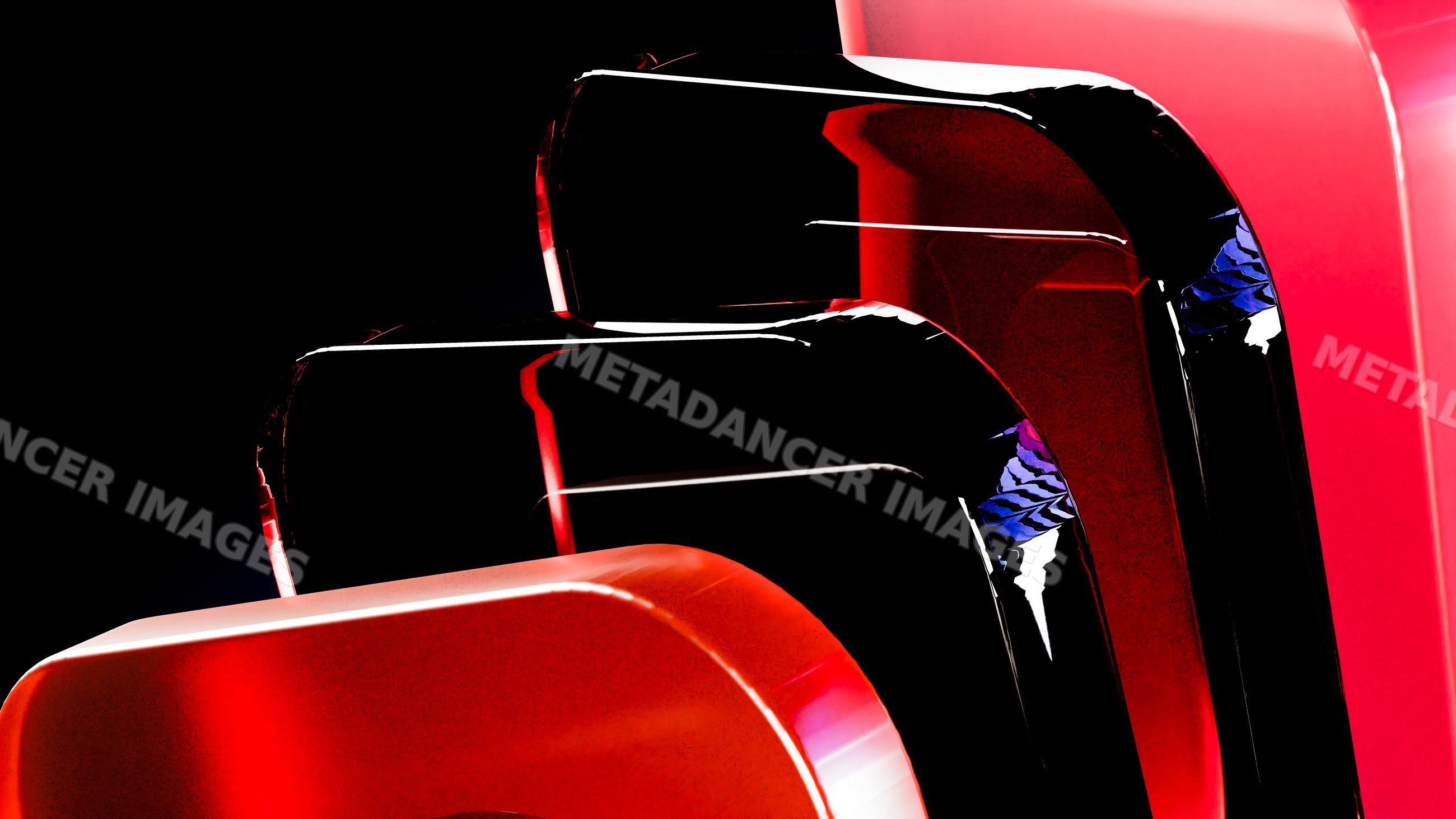 Modern abstract red and black glossy sculptures with curved shapes