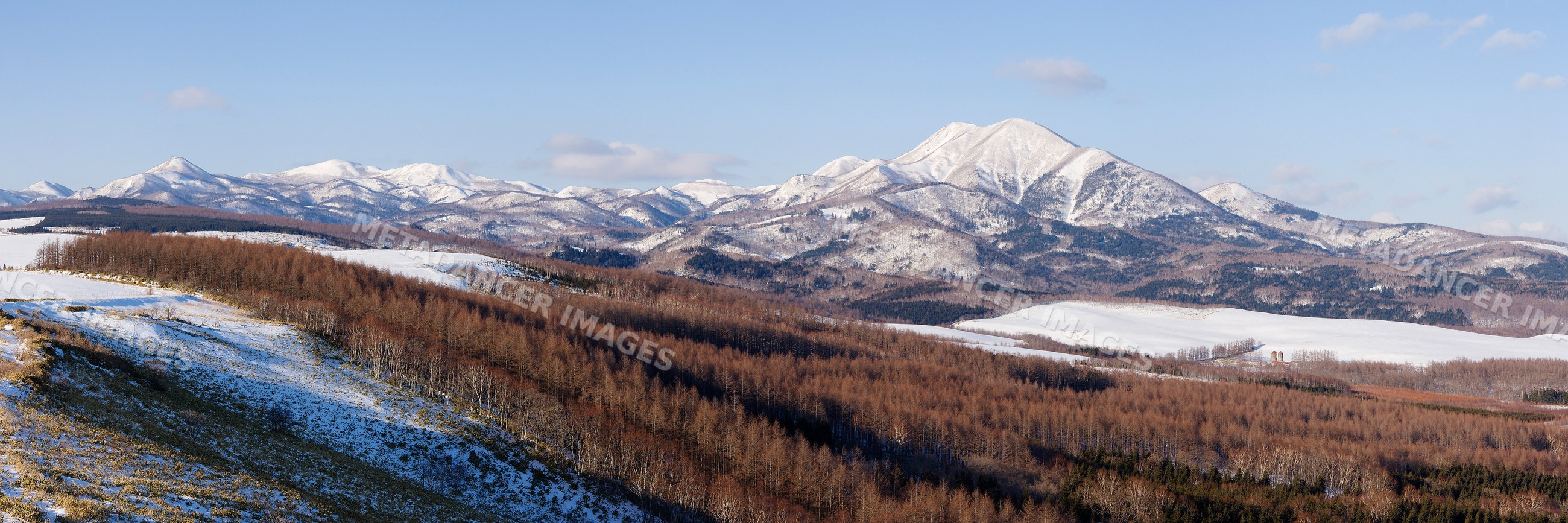 Mount shari snow-capped mountain range on shiretoko peninsula japan