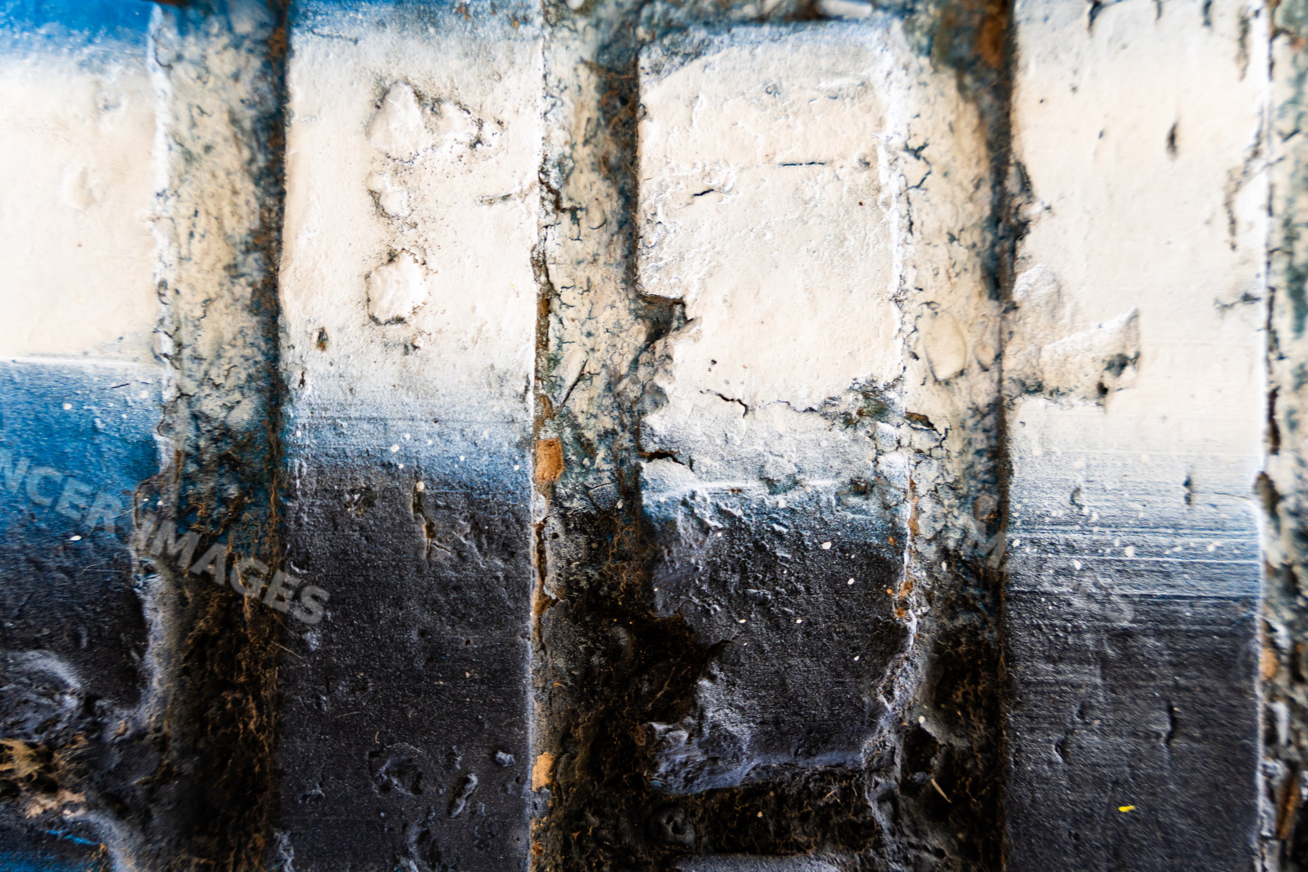 Weathered abstract textured surface with layered paint