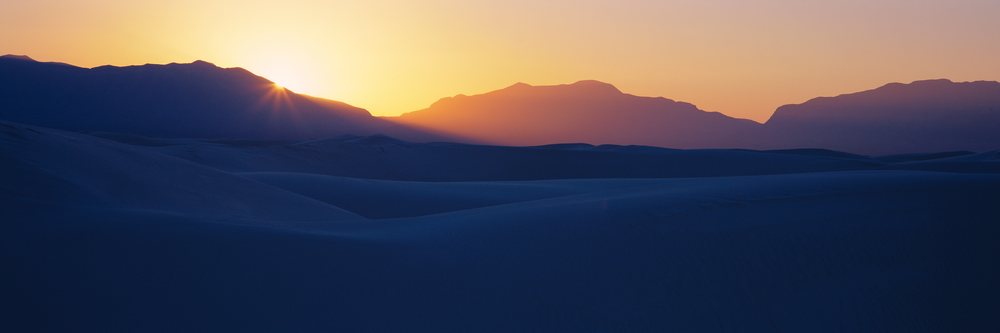 Sunrise over sand dunes